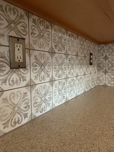 Outlet cut tile work